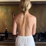 Gwyneth Paltrow puts on a very cheeky display as she cooks topless and serves up a 'boyfriend breakfast'