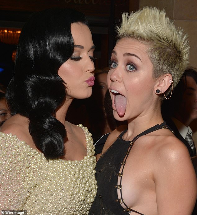 A source close to Cyrus fears that she may suffer the same fate as her long-time friend and fellow popstar Katy Perry , 40, who has faced a series of career setbacks over the past year. (Pictured: Katy Perry and Miley Cyrus in 2013).