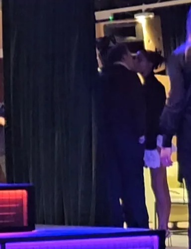 Maura Higgins and Danny Jones kissing at a Brit Awards after-party.