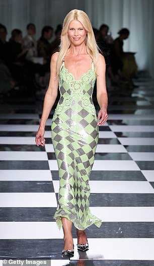 Claudia walked the runway at the Versace fashion days before