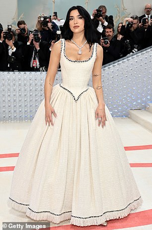 Dua Lipa radiated the energy of a princess as she arrived at the 2023 Met Gala in Claudia's vintage Chanel gown paired with a 225-carat diamond necklace