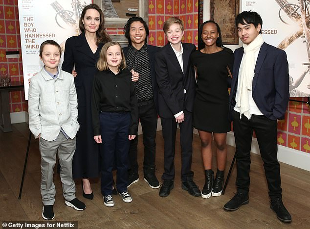 It was also recently revealed that the Meet Joe Black actor believes his relationship with two of his children is 'unfixable'; Jolie and their children seen in 2019 in NYC