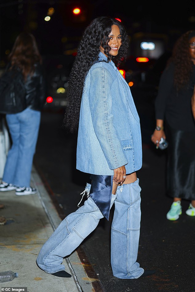 Finishing her trendy ensemble, Ciara showcased her natural long curls as she let her raven tresses flow freely down her back