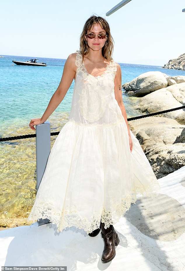 Maia Mitchell commanded attention at the event as she slipped into a white lace gown which she paired with black leather boots
