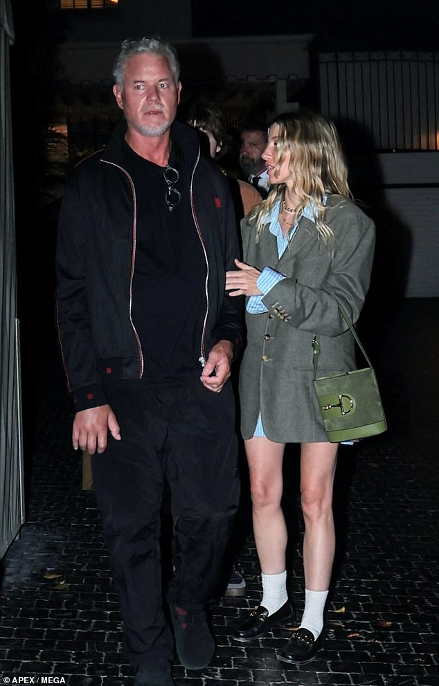 He was spotted out on a date with a mystery woman who bore a striking resemblance to Rebecca on Tuesday
