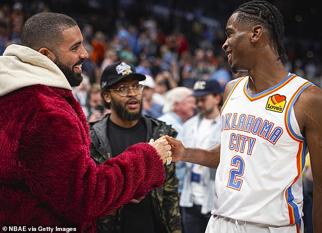 Drake tagged Oklahoma City superstar Gilgeous-Alexander into the post, writing, 'Check that box @shai.' Pictured in December of 2021