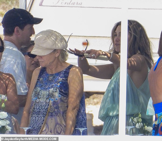 Also joining the couple for the beach day, were several famous faces from Delta's inner circle, including her mother Lea and brother Trent
