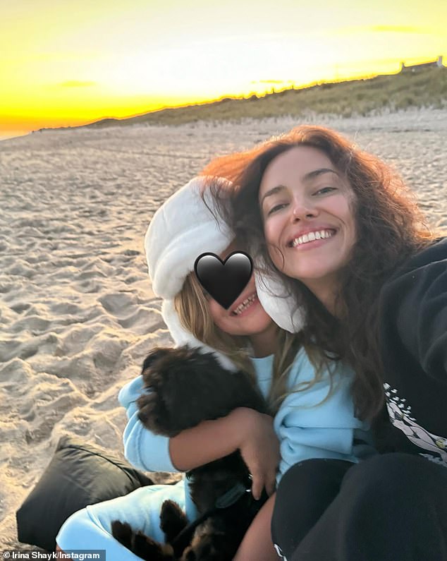 Meanwhile, Bradley and his ex-fiancée Irina Shayk (R, pictured October 13) - who employ no nannies - share 50/50 joint legal and physical custody of Lea following the end of their four-year romance in 2019