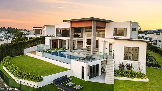Located in the exclusive neighbourhood of Helensvale, 12km from the CBD, the sprawling resort-style 'party pad' boasts five bedrooms and six bathrooms
