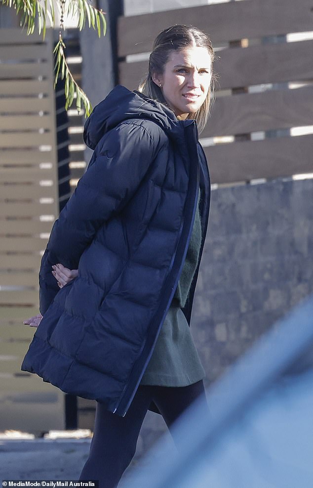 The former Bachelorette star, who met Lee on the 2016 season of the show, covered up her ensemble with a black puffer jacket