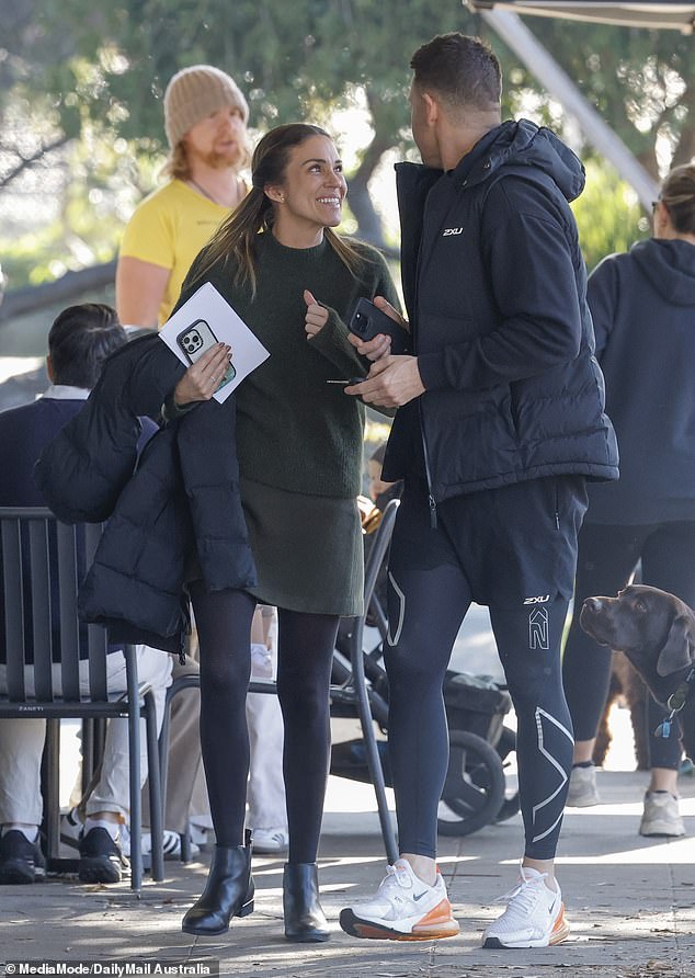 The exes were all smiles as they then went out to a local cafe together to celebrate the sale
