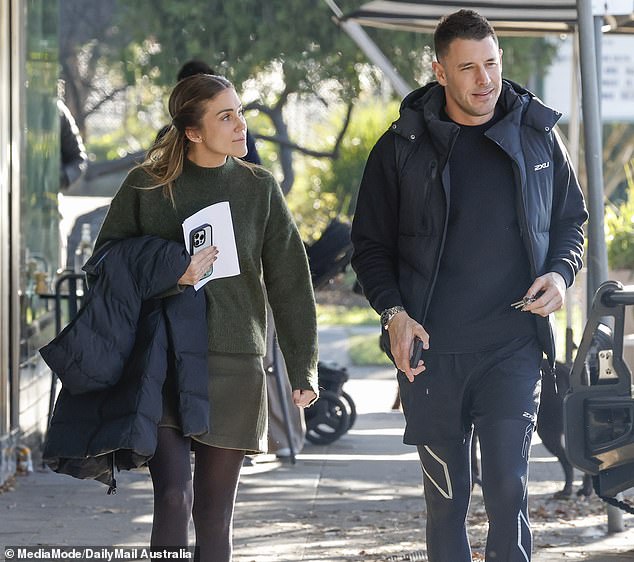 The former couple appeared very friendly with each other over the weekend as they attended the auction of their Hampton East love nest in Victoria