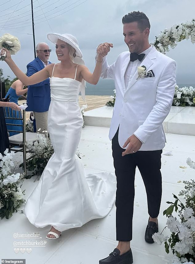 Hannah stunned onlookers as she walked down the aisle in a classic silhouette, opting for a simple gown with a square neckline