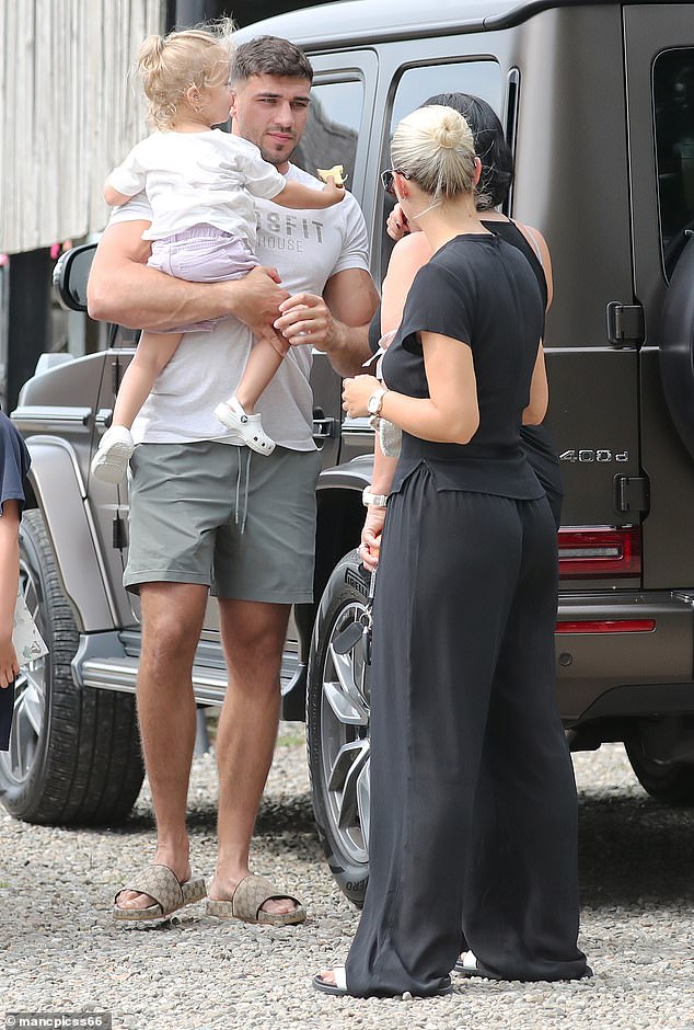 The couple also brought along their daughter Bambi with Tommy seen carrying her on the outing