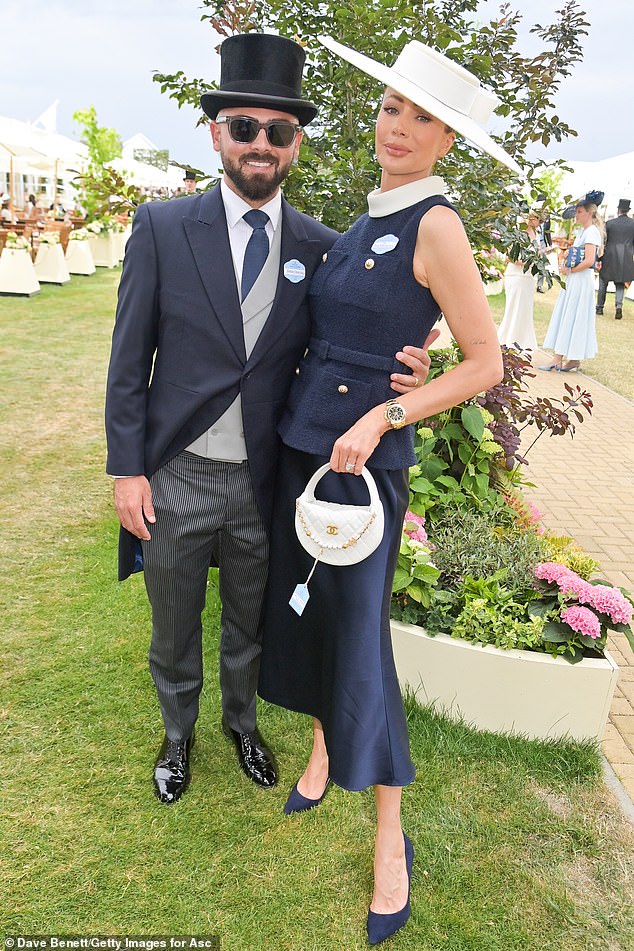 The presenter continued: 'We know Kylie’s breasts are fake. What about talking about lipo and BBLs? Their bodies are not created in the gym' (pictured with her husband Brad at Royal Ascot)