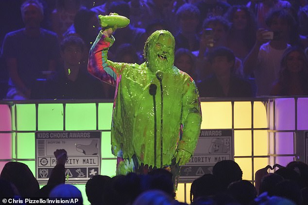 But after speaking on the stage, the actor was splashed with the iconic neon green slime