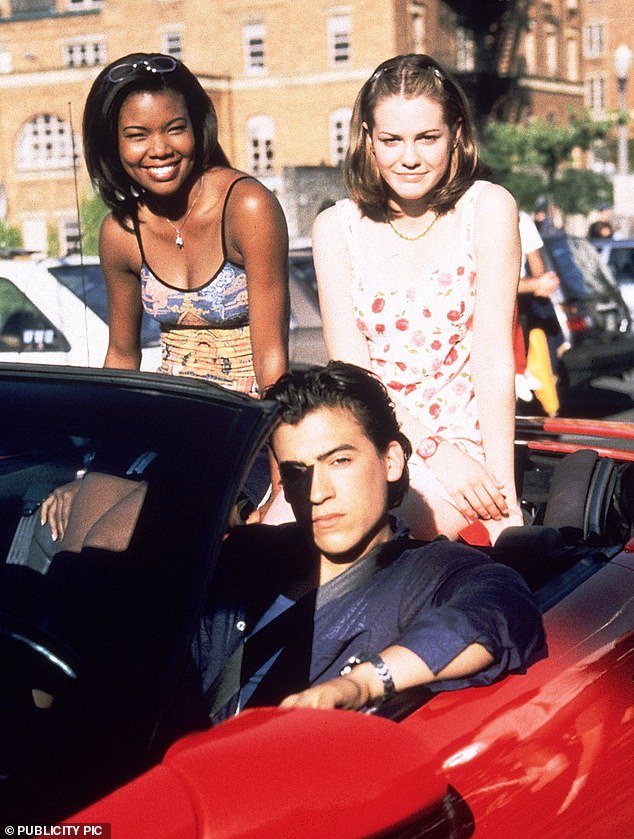 Near the turn of the century, she landed supporting roles in 10 Things I Hate About You and She's All That, rising to fame in the 1999 romantic comedies; pictured with Andrew Keegan and Larisa Oleynik in 10 Things I Hate About You still