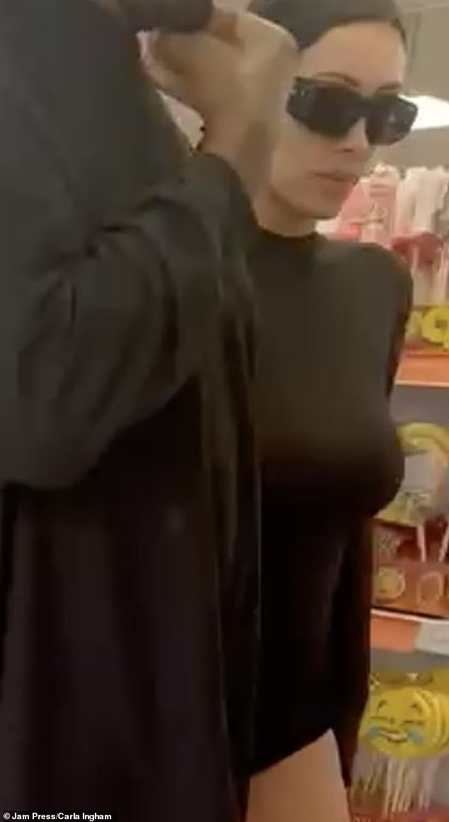 The couple were seen perusing the budget souvenirs and snacks on offer in the shop, after Bianca sparked outrage with another near-nude display