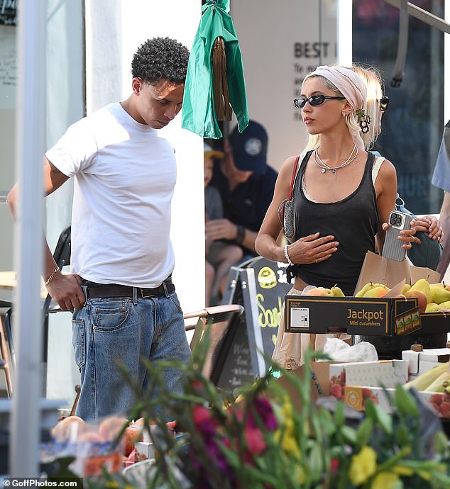 They stopped by a fruit stall at the market to buy some snacks to enjoy in the glorious London weather
