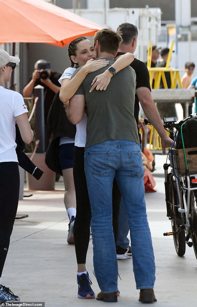 Garner, 53, flung her arms around her love, greeted him with a kiss, before holding him close