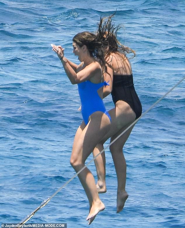 Delta appeared excited, before letting out a scream as she fell into the sea