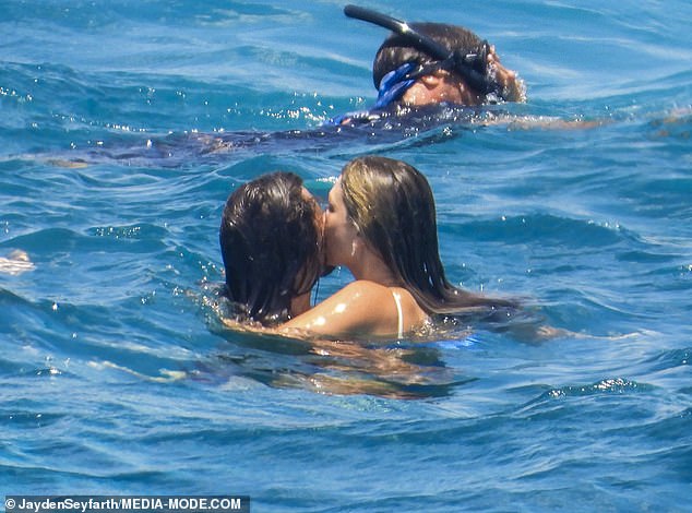 Delta and Matt couldn't keep their hands off one another while in the water