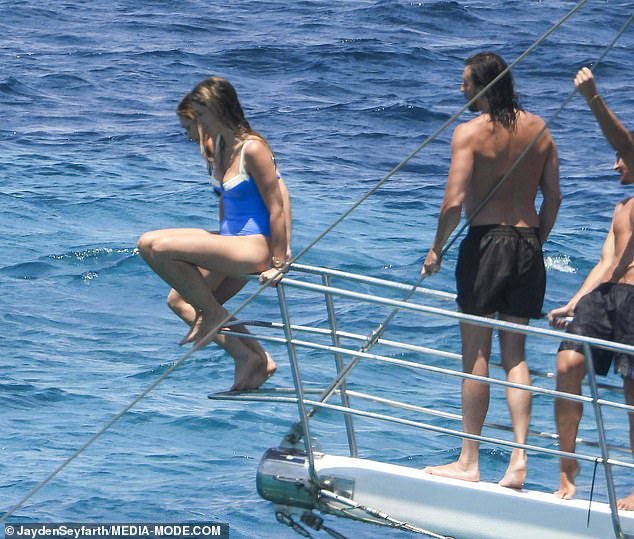 Matthew watched on as Delta and friend were seen jumping off the boat's edge