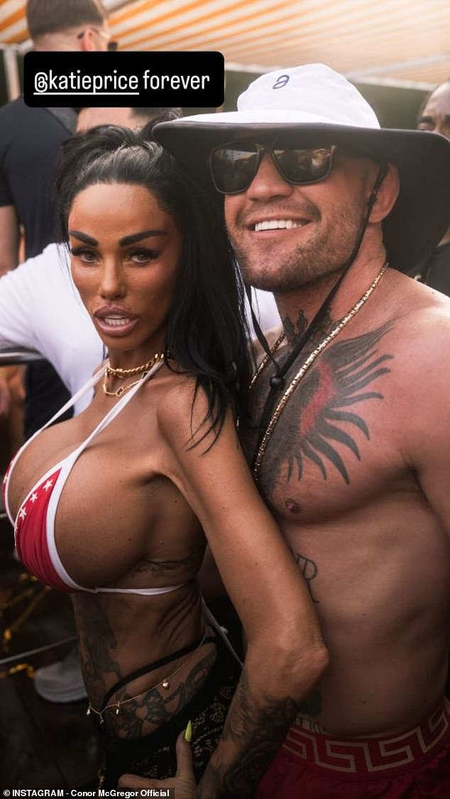 While in Ibiza she partied with Irish boxer Conor McGregor as she pressed her body up against his for a picture