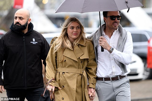 Burfoot, 29, who is living in Tasmania, was seen arriving at the NSW courthouse with her new fiancé Clint Rice while a bodyguard followed them