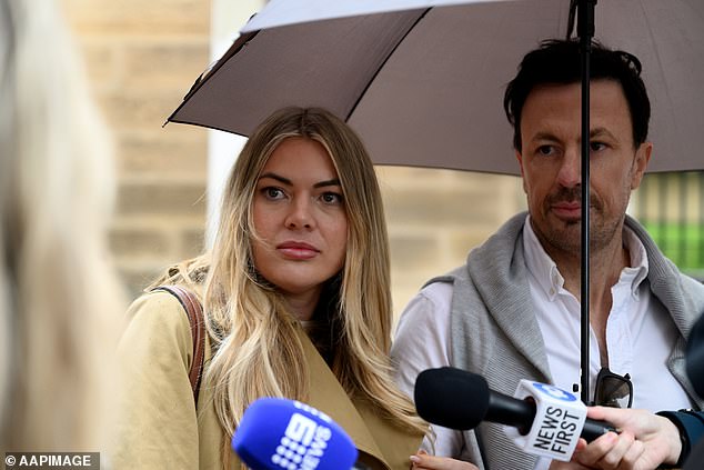 Burfoot appeared glum as she answered questions outside court