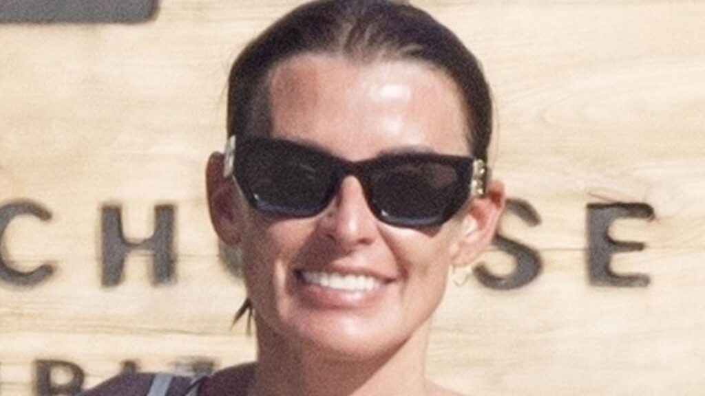 Coleen Rooney shows off her incredible abs in sea with fellow WAG on holiday with family in Ibiza