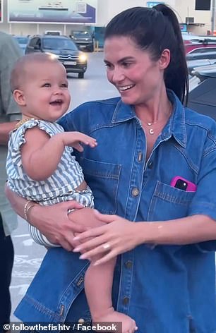 In the footage, the proud mother and daughter were all smiles, while a voice behind the camera asks, 'Who is it?