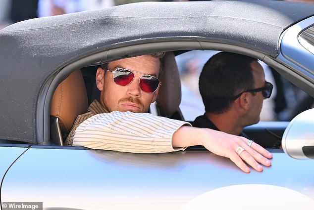 The Marvel star arrived in style to the show as he pulled up in a silver £100K Porsche 911