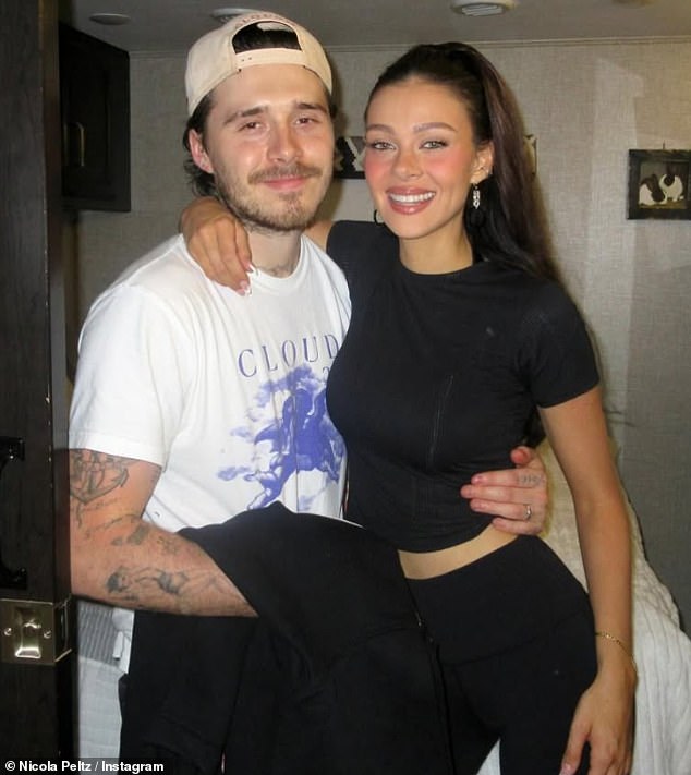 Nicola captioned the post: '5 years ago we got engaged. i love living life with you baby - i loveee you so muchhh [sic]'