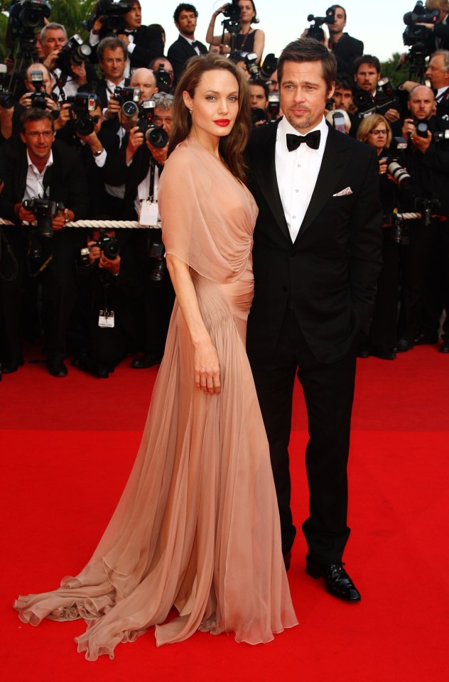 Brad Pitt and Angelina Jolie at a film premiere.