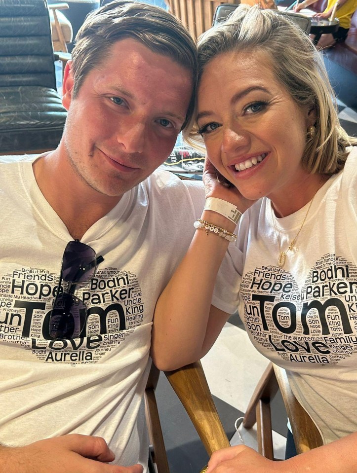Kelsey Parker and Will Lindsay wearing matching memorial t-shirts.
