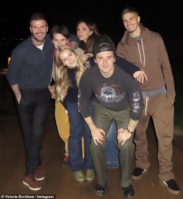 Despite flying to London at the time, Brooklyn and Nicola also didn¿t attend the big family party at the Beckhams¿ Cotswolds home or an idyllic trip to France or a meal at Notting Hill restaurant, Core (pictured with his parents and siblings Romeo, Cruz, and Harper)