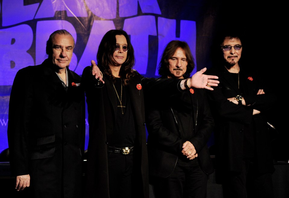 Black Sabbath band members at a press conference.