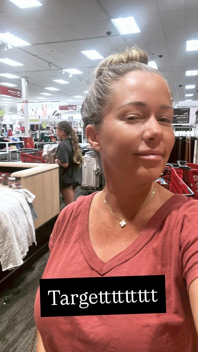 For the outing, which included a stop at Target per her Instagram Story, Kendra was casually dressed in a faded red shirt and loose-fitting black jeans