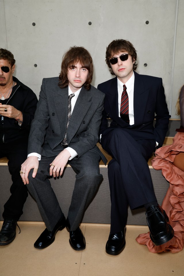 Gene Gallagher and Lennon Gallagher at a Saint Laurent fashion show.