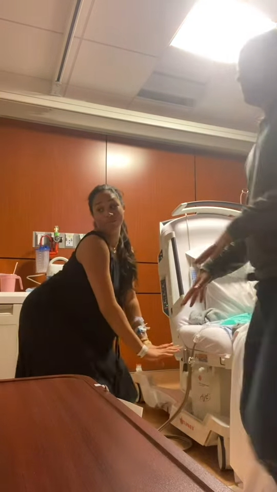 Meghan Markle and Prince Harry in a hospital room after the birth of their daughter.
