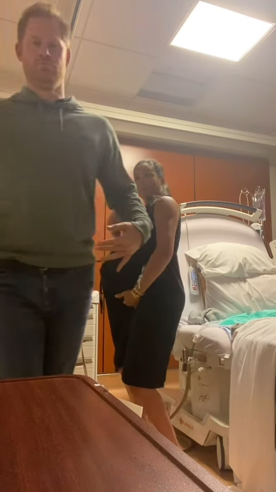 Meghan Markle and Prince Harry in a hospital room.