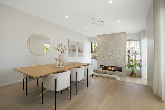 The home is 'flooded with natural light' thanks to an extraordinarily high stud ceiling