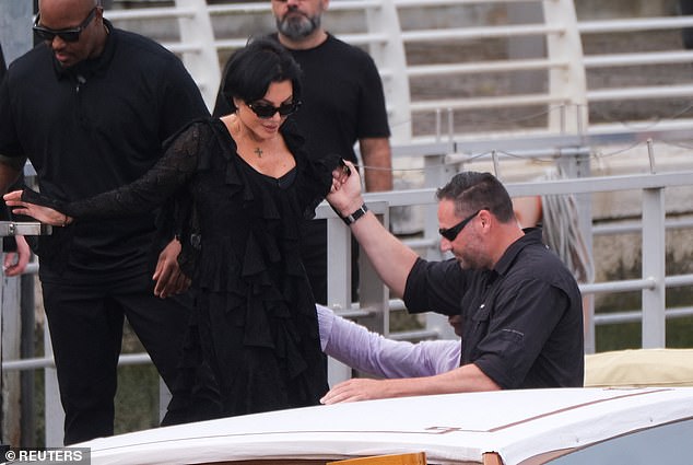 Kris received a helping hand as she made her way onto the river taxi