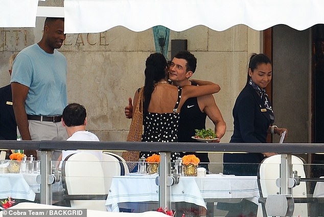 Orlando was later seen sharing a hug with entrepreneur Elsa Marie Collins, who is one of Lauren's closest friends, as they dined al fresco
