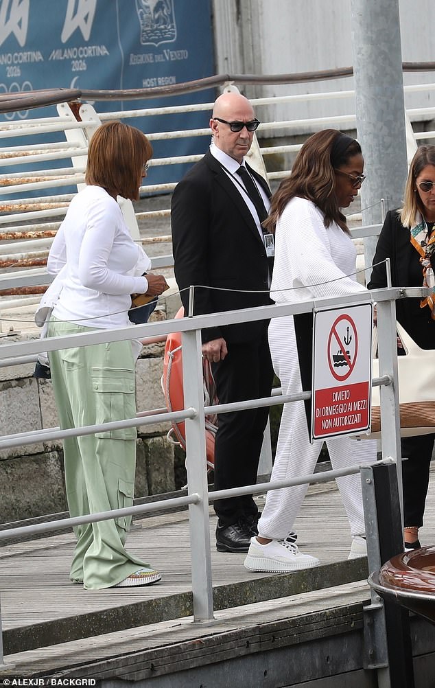 Gayle followed her pal Oprah to the boat as they prepared to join the celebrations