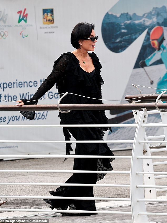 Kris looked incredible in her floor length gown that was adorned with ruffle detailing