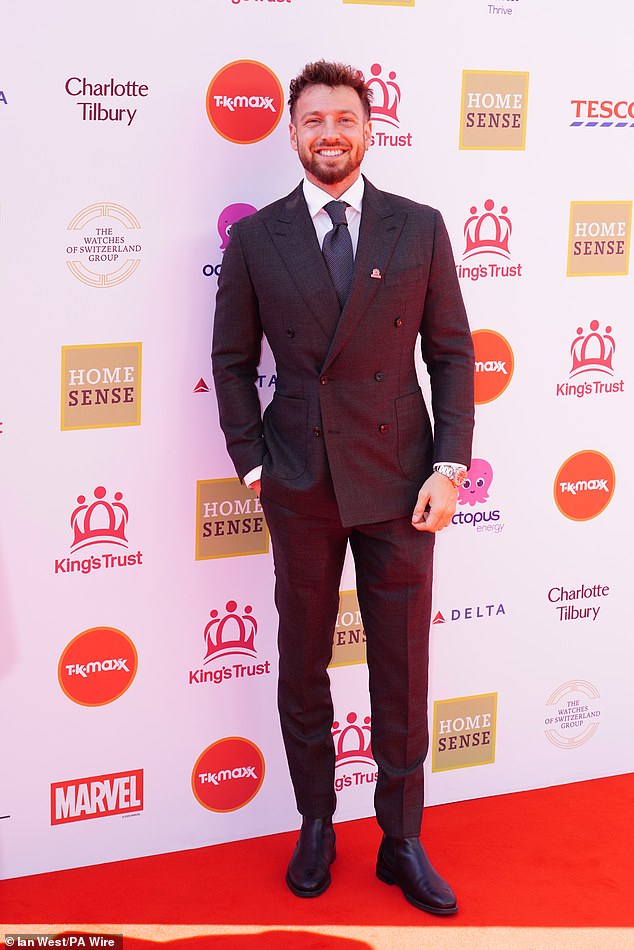 Sam Thompson dressed smart in a suit as he arrived at the event