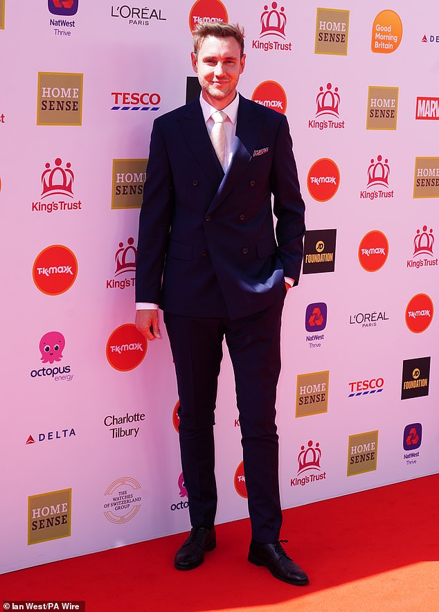 Cricket star Stuart Broad rocked a navy suit and yellow tie