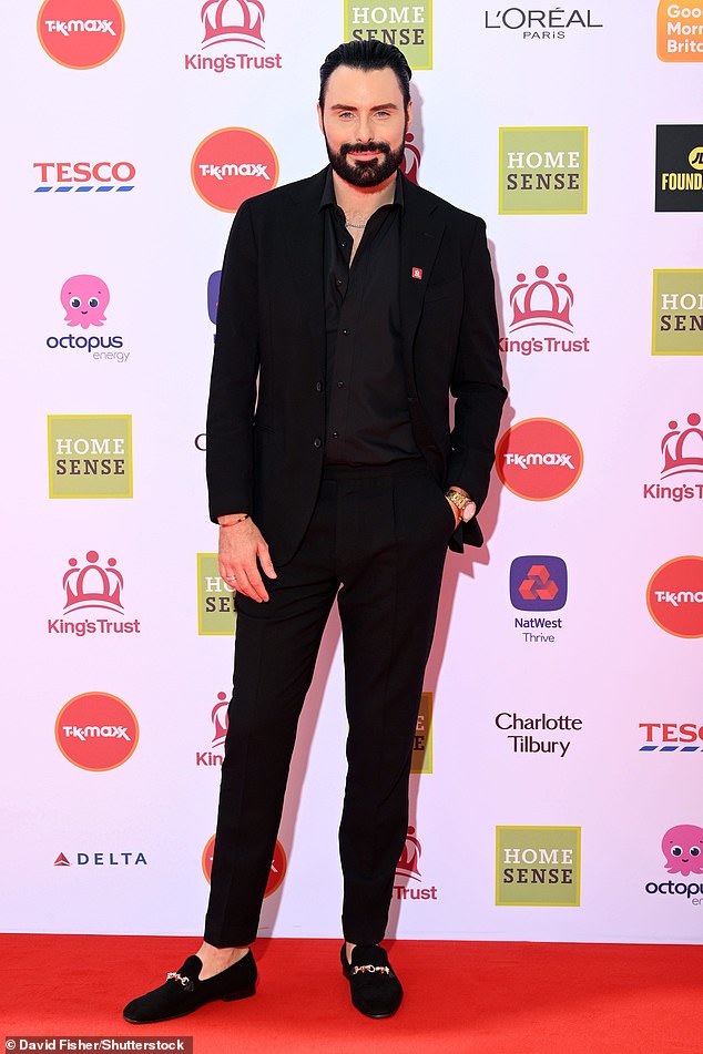 Rylan Clark posed in all black at the event